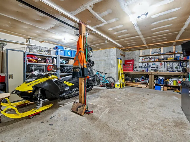 Garage featuring a workshop area