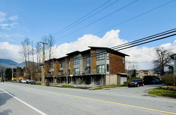 View of property with a mountain view