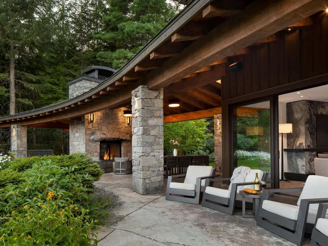 View of patio / terrace featuring an outdoor living space with a fireplace
