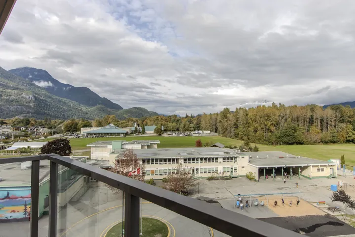 View of building exterior featuring a mountain view