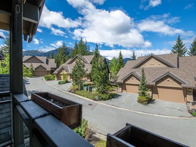 Residential development featuring multiple properties with attached garages