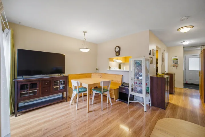 Dining area featuring light wood-style floors
