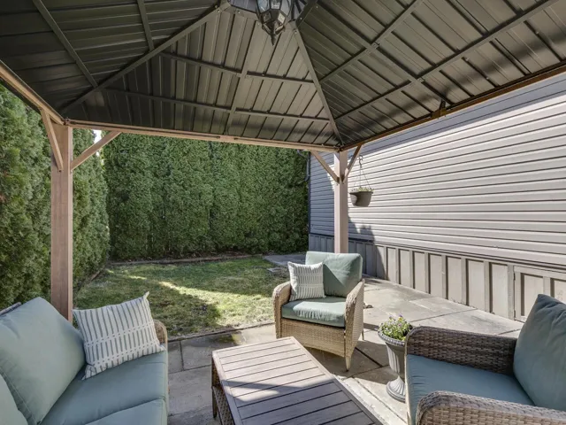View of patio with an outdoor lounge area and a gazebo