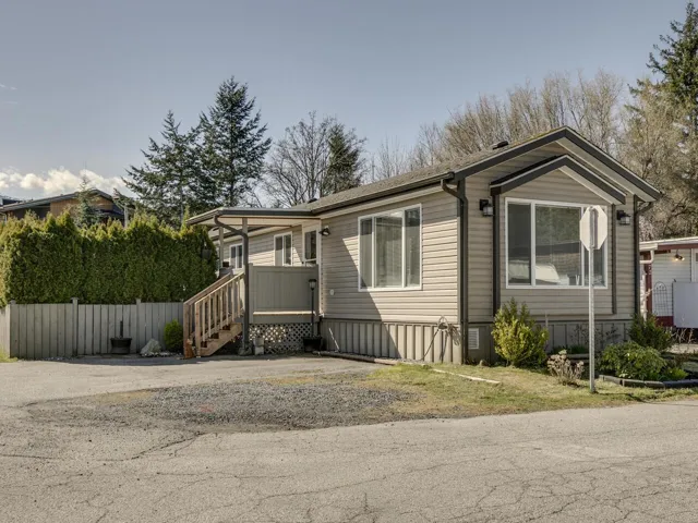 Manufactured / mobile home with a wooden deck
