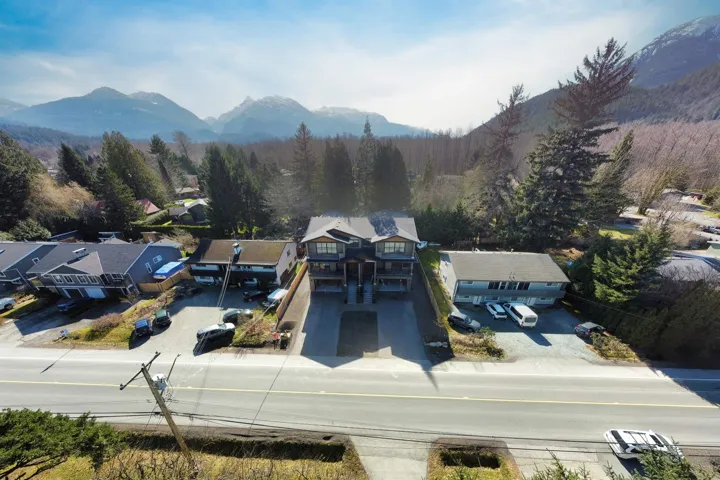 Aerial view of residential area featuring mountains
