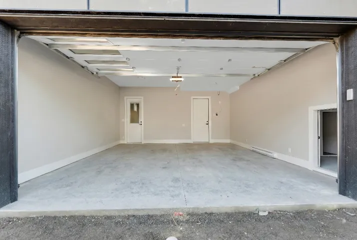Garage with a baseboard radiator