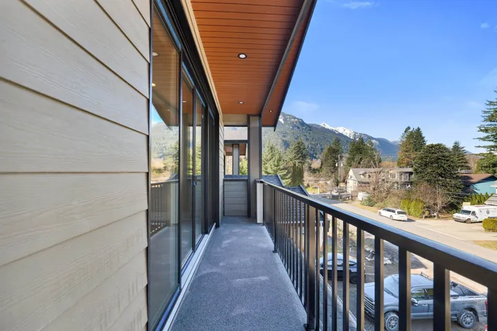 Balcony with a residential view and a mountain view