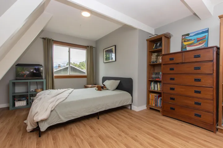 Bedroom with light wood-style flooring and recessed lighting