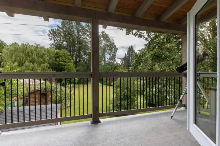 View of balcony off of the primary bedroom