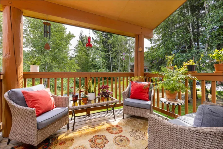 Wooden terrace featuring an outdoor living space