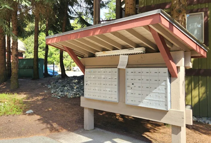 View of home's community with mail area