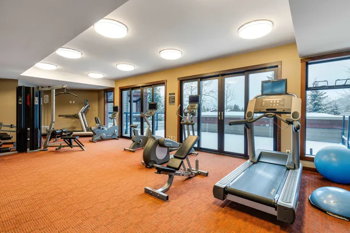 Exercise room featuring carpet