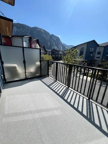 Balcony featuring a mountain view and a residential view