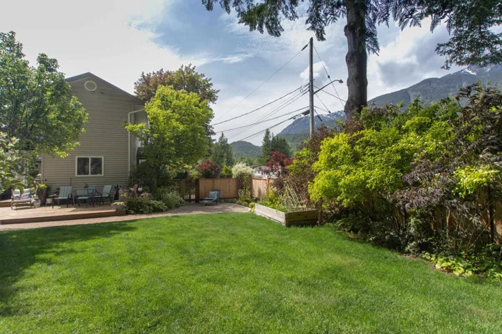 View of yard featuring a vegetable garden and a mountain view