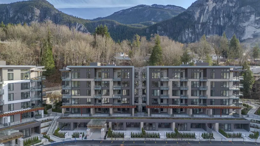 View of apartment building / complex featuring a mountain view
