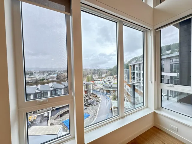 Detailed view of wood finished floors and baseboards