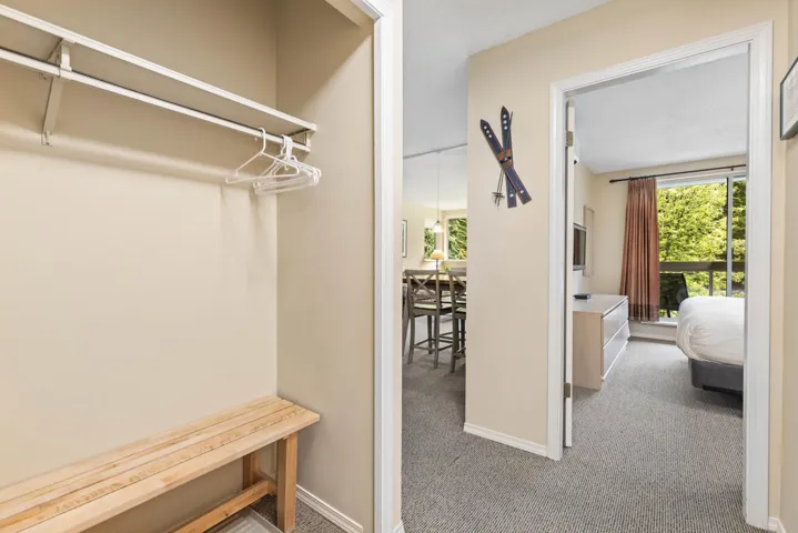 Walk in closet featuring carpet
