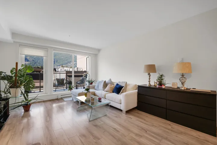 Living area with light wood finished floors