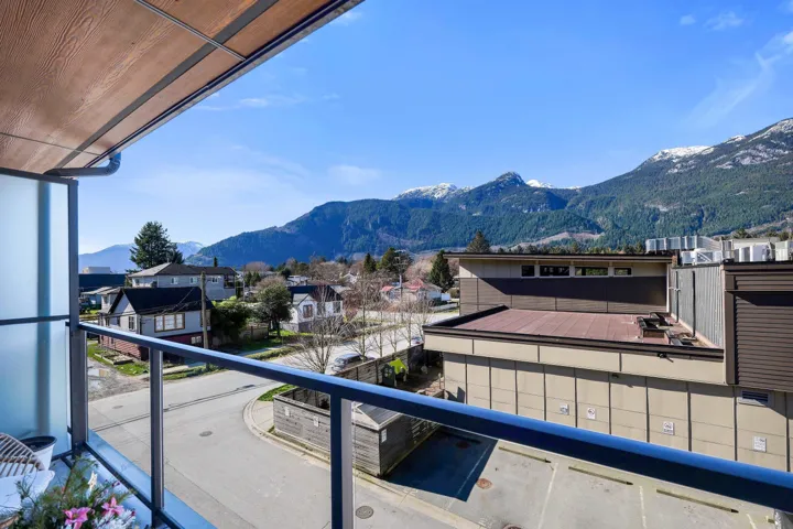 Balcony with a mountain view and a residential view