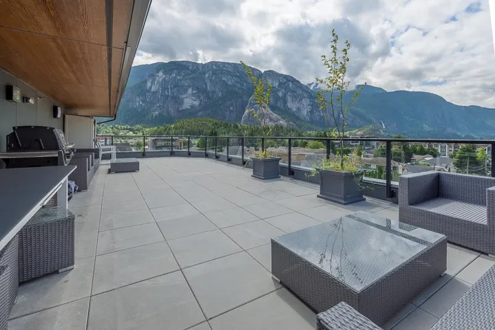 View of patio / terrace with an outdoor living space and a mountain view