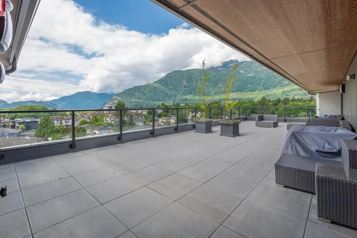 View of patio / terrace with an outdoor hangout area and a mountain view