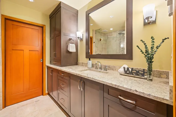 Full bath featuring vanity, a stall shower, and recessed lighting