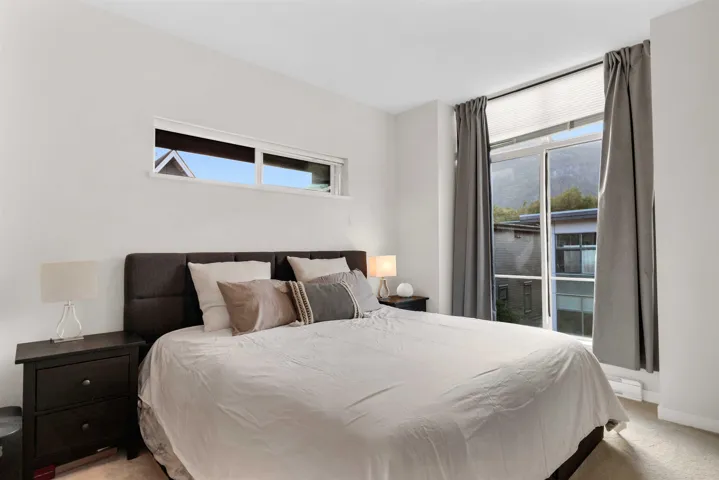Bedroom with light carpet