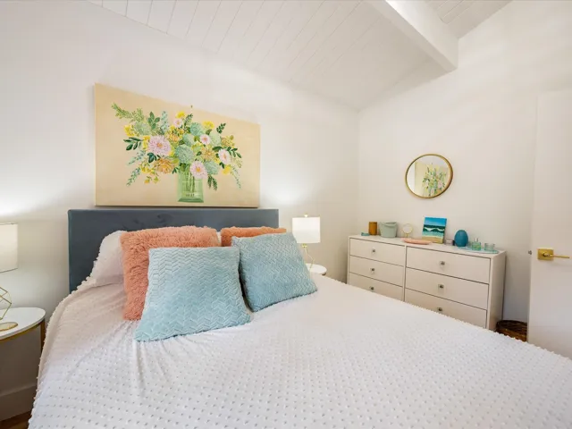 Bedroom with wooden ceiling