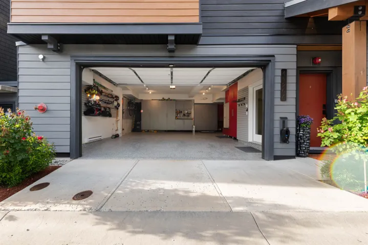 Garage with concrete driveway