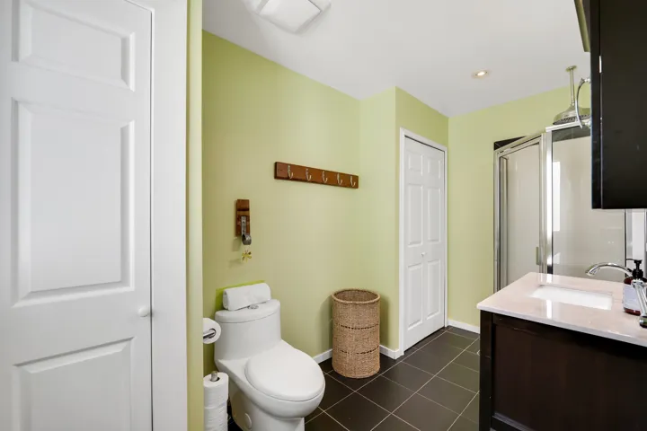 Bathroom with walk in shower.
