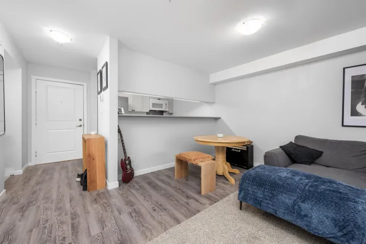 Interior space with wood finished floors and baseboards