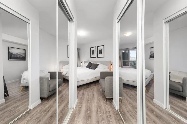 Bedroom with baseboards and light wood-style floors