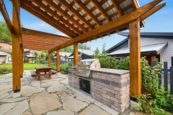 View of patio / terrace featuring a pergola and an outdoor kitchen