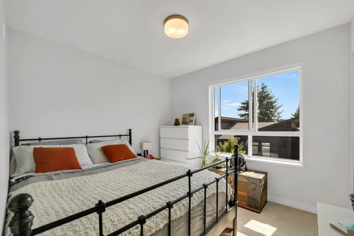 Bedroom with carpet and baseboards