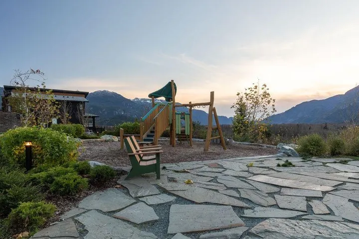 Community jungle gym with a mountain view