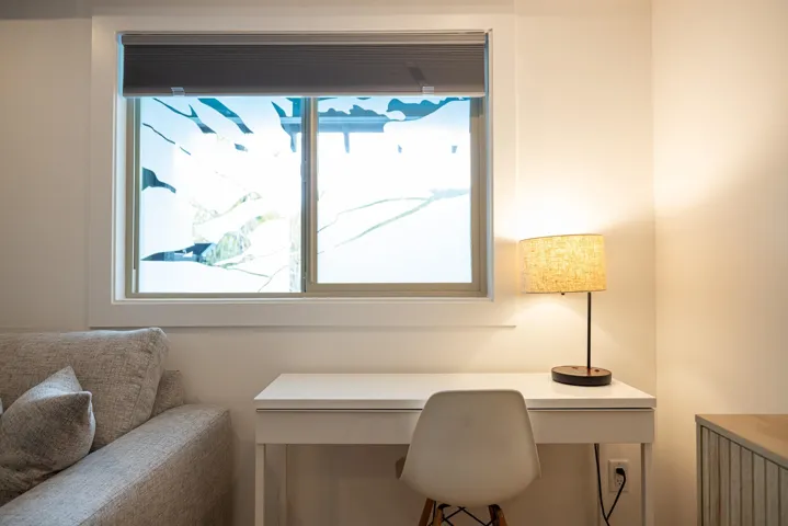 Office area featuring built in desk