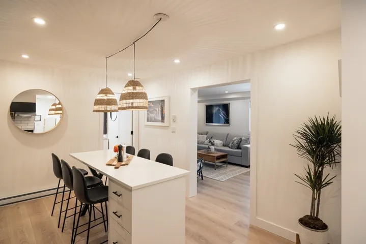 Interior space featuring light wood finished floors, recessed lighting, and a baseboard heating unit