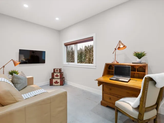 Interior space with recessed lighting, baseboards, and concrete floors