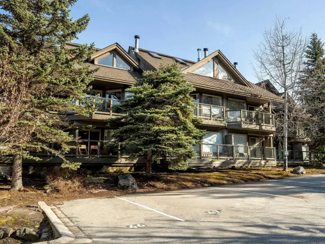 View of front of property with a balcony