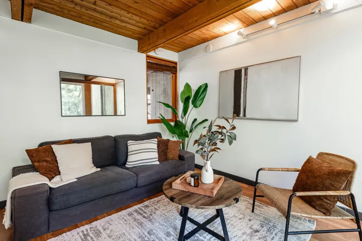 Wood-finish ceiling with exposed beams