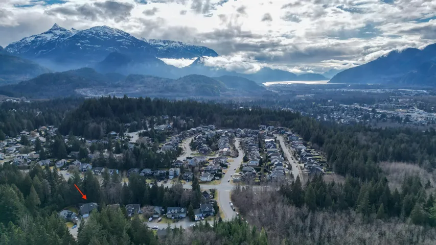 Property view of mountains with a view of trees