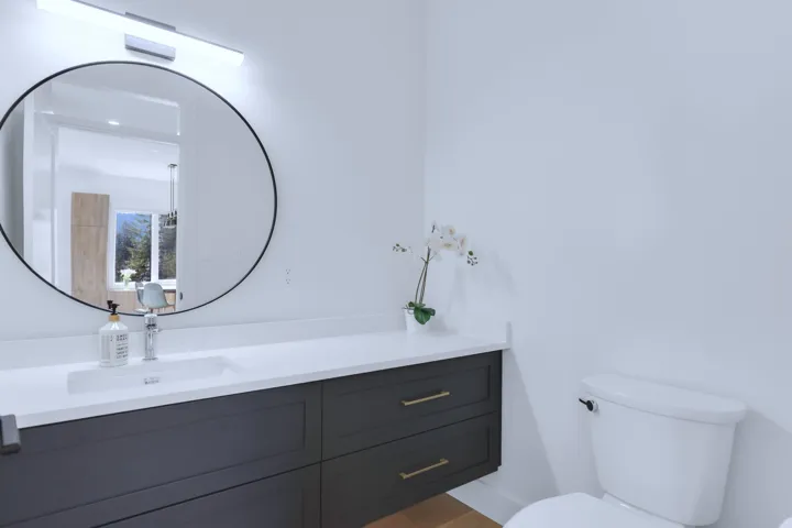 Bathroom with toilet and vanity