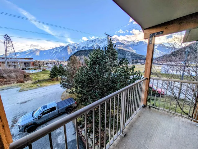 Private balcony with concrete flooring and metal railings