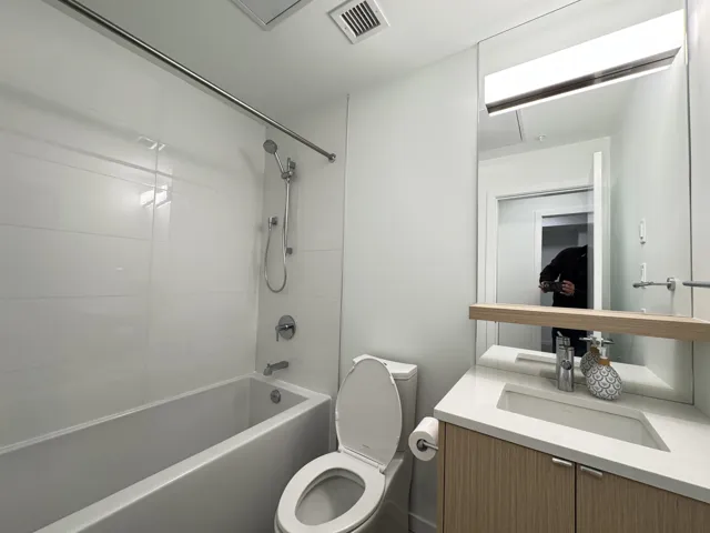 Full bathroom with shower / tub combination and vanity