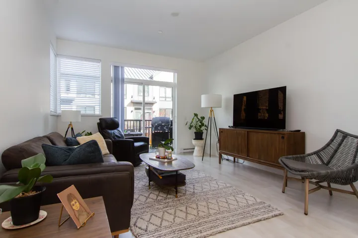 Living area with light wood-style flooring
