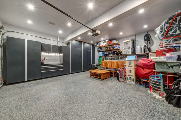 Miscellaneous room featuring recessed lighting and speckle patterned floor