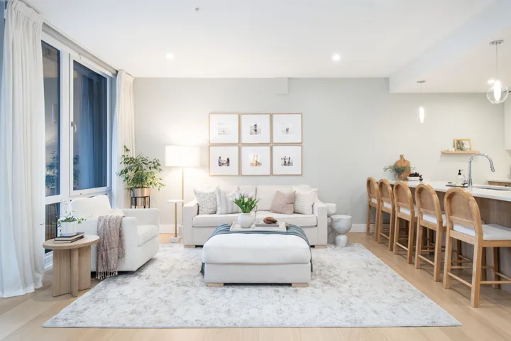 Living area featuring baseboards, wood finished floors, and recessed lighting