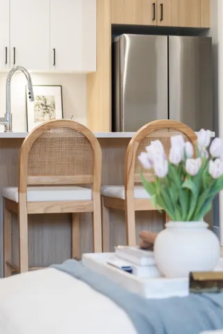 Interior details with freestanding refrigerator and a sink