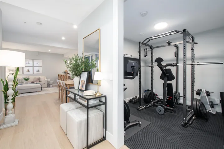 Exercise area featuring baseboards and recessed lighting