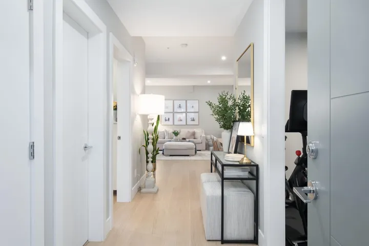 Hall featuring light wood-style flooring and recessed lighting